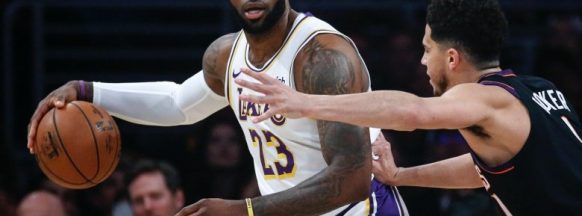 Lakers jump all over  Suns, then hang on for win