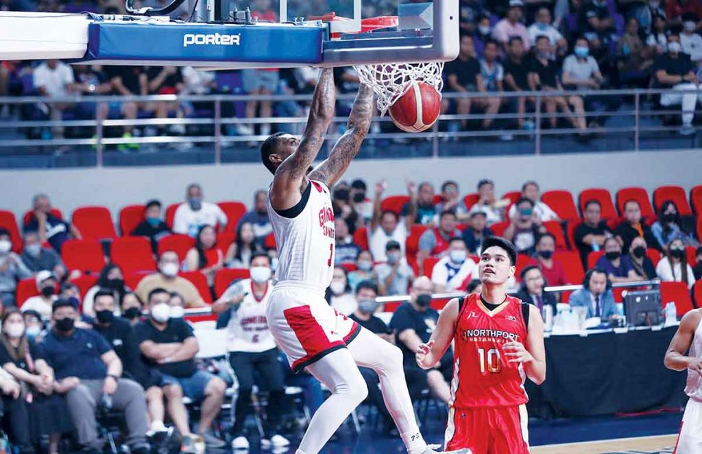 Barangay Ginebra San Miguel Kings’ Jamie Malonzo scores on a two-handed as NorthPort Batang Pier’s Arvin Tolentino looks on. (PBA photo)