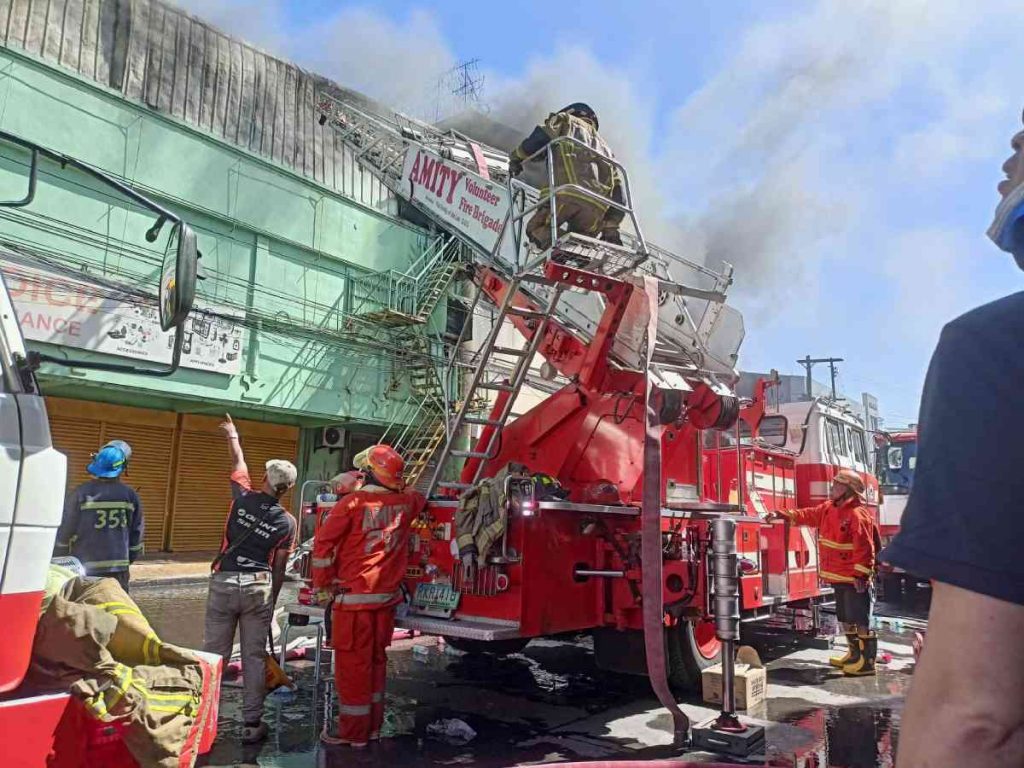 A commercial building at the corner of Locsin and Luzuriaga streets in Bacolod City caught fire yesterday morning. The blaze reached the second alarm, leaving two establishments partially-damaged, a report from the Bureau of Fire Protection in Bacolod says. (Aksyon Radyo Bacolod photo)