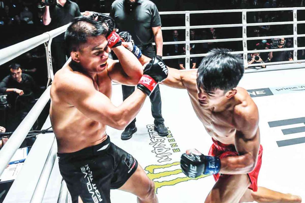 Danny Kingad (right) proves superior at striking and stunning Eko Roni Saputra at ONE Fight Night 7 on Saturday, February 25, 2023. (ONE FC photo)