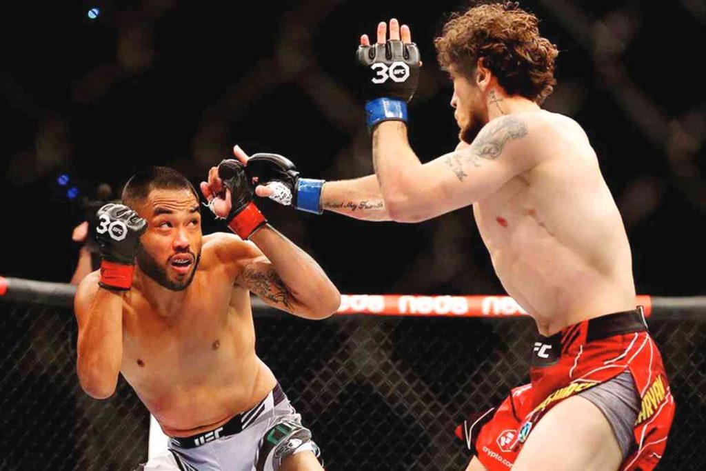 Josh Culibao (left) of Australia in action against Melsik Baghdasaryan of Armenia during their Featherweight bout at UFC 284 on February 12, 2023. (EPA-EFE/Richard Wainwright photo)