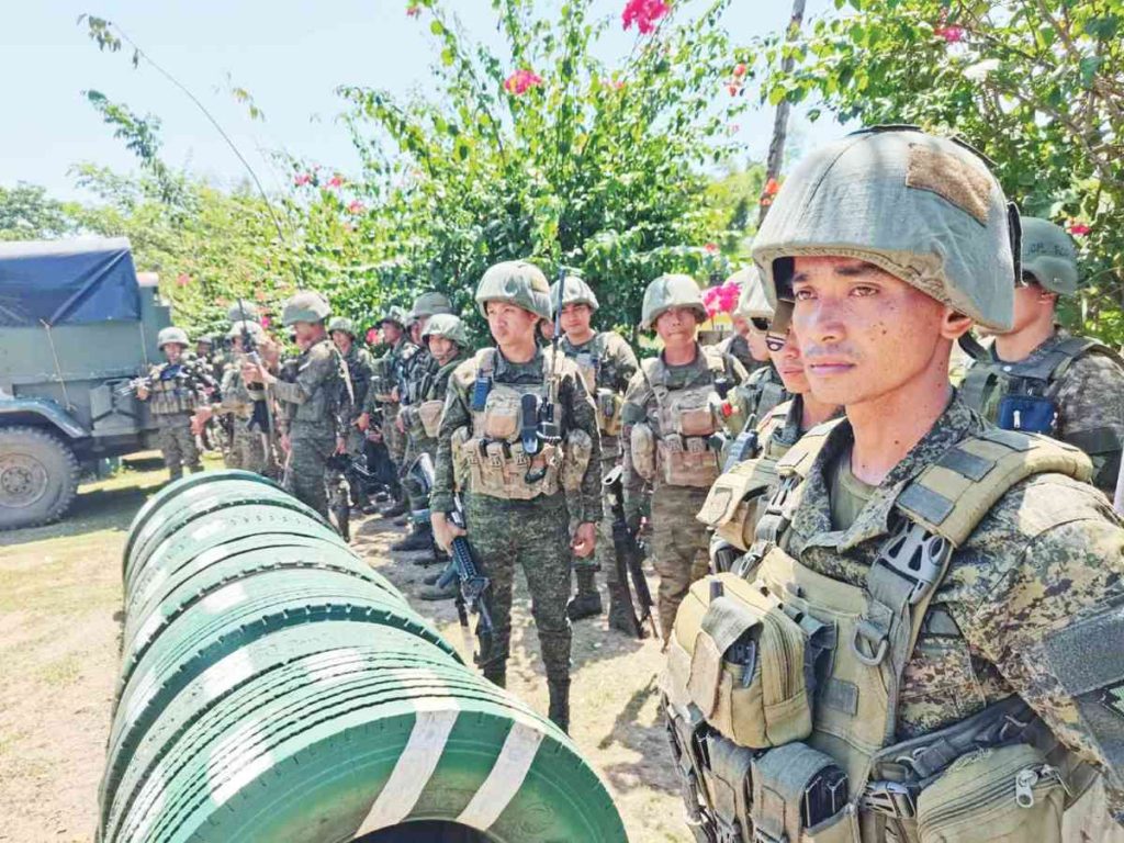 More than 100 Armed Forces of the Philippines soldiers from different battalions in Negros Oriental were deployed to intensify checkpoint and security operations in the province, in the sendoff ceremony at the 11th Infantry Battalion quarters in Siaton town’s Barangay Salag on Sunday morning, March 12, 2023. (PNA photo)