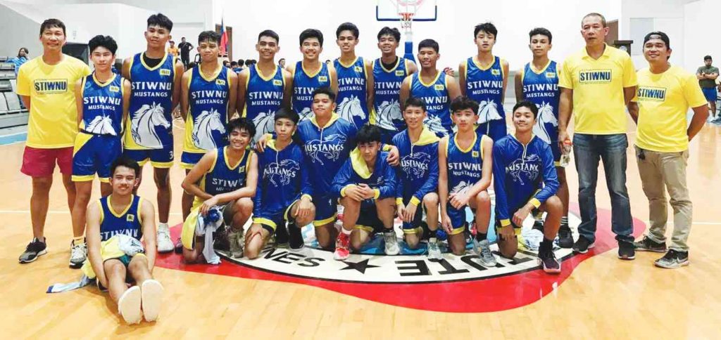 STI-West Negros University Mustangs pose for a picture after beating St. John’s Institute Falcons in the do-or-die semifinals on Thursday night, March 2, 2023. (Contributed photo)