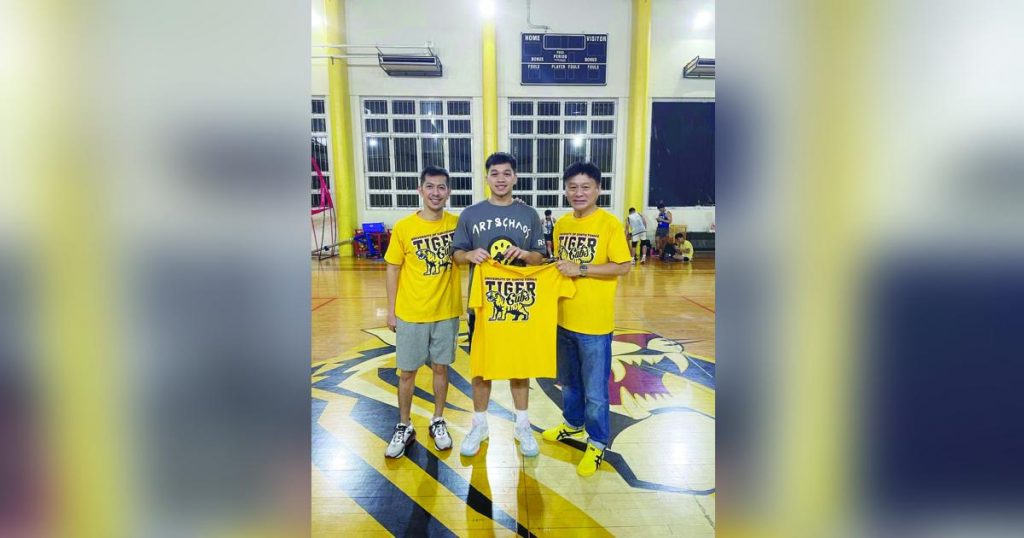 Dylan Despi (center) was with University of Santo Tomas Tiger Cubs head coach Manu Inigo (left) and team manager Jarvis Co. (Contributed photo)