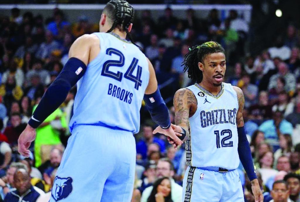 Dillon Brooks (24) of the Memphis Grizzlies and Ja Morant (12) of the Memphis Grizzlies during the first half against the Los Angeles Lakers of Game 5 of the Western Conference first round playoffs at FedExForum in Memphis, Tennessee. (Justin Ford/Getty Images/AFP photo)