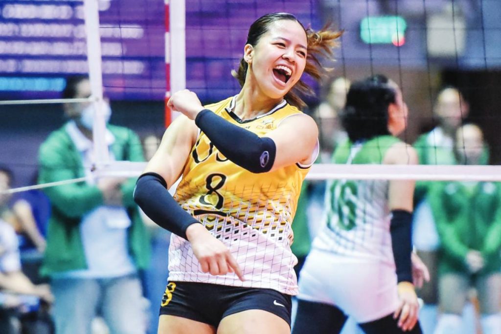 Ejiya Laure of University of Santo Tomas Golden Tigresses celebrates after their victory over De La Salle University Lady Spikers. (UAAP photo)