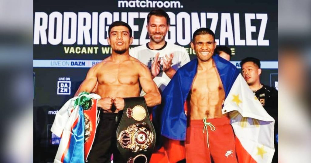 Filipino boxer Marlon Tapales (right) emerged victorious with the WBA and IBF super bantamweight belts after a split decision win over Murodjon Akhmadaliev. (Sanman Promotions photo)