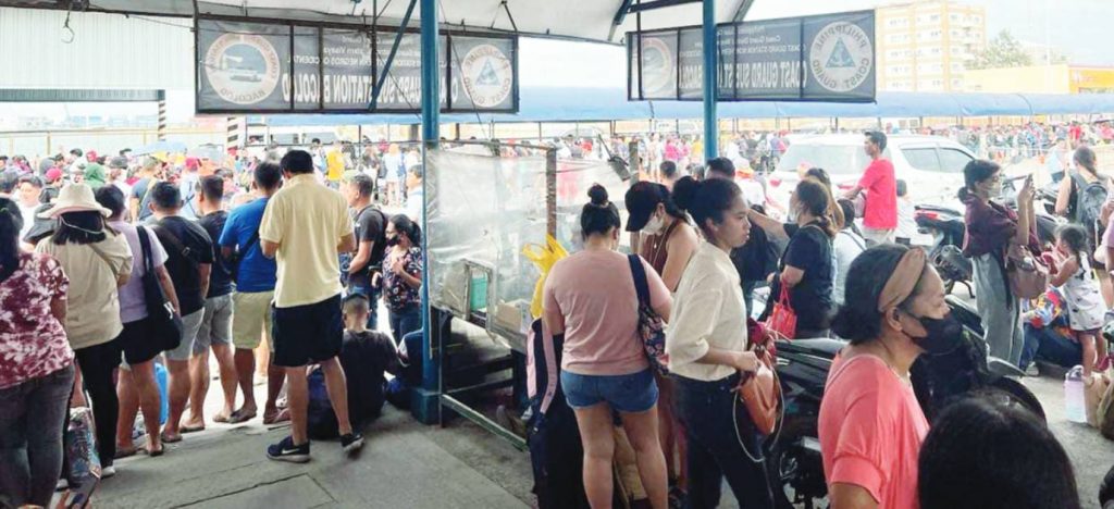 Sea travelers flocked to Bacolod City’s Bredco Port yesterday afternoon, April 10, 2023, after the Holy Week break and long weekend. The Coast Guard District in Western Visayas recorded more than a million sea travelers passing through various seaports in the region during the period. (PCG Western Visayas photo)