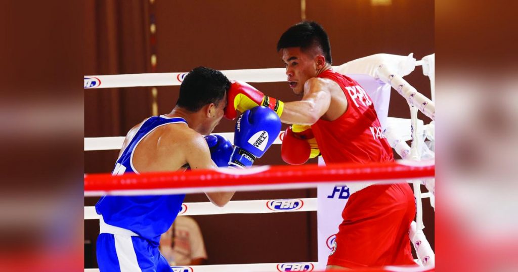 Filipino boxer Carlo Paalam attempts a left straight against Aldoms Suguro of Indonesia. (Photo courtesy of Philippine Media Pool)Filipino boxer Carlo Paalam attempts a left straight against Aldoms Suguro of Indonesia. (Photo courtesy of Philippine Media Pool)