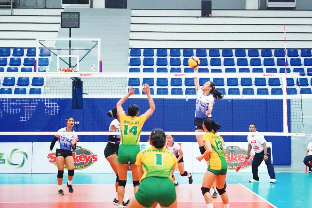 Bacolod Tay Tung High School Thunderbolts’ Camila Amor Bartolome goes for a drop shot against Naga College Foundation. (Photo courtesy of Shakey’s Girls Volleyball Invitational)