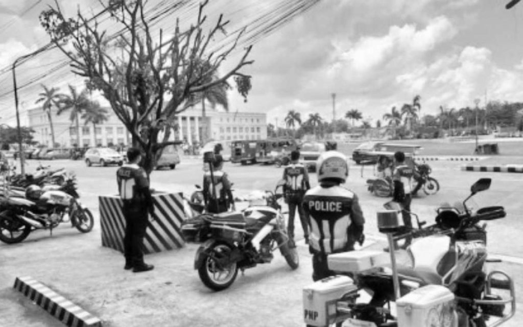 Personnel of the Bacolod City Police Office Traffic Enforcement Unit monitor the protest of some transport groups at the Government Center grounds yesterday, May 8, 2023. The strike failed to paralyze the operations of businesses and schools in the city. (TEU-BCPO photo)