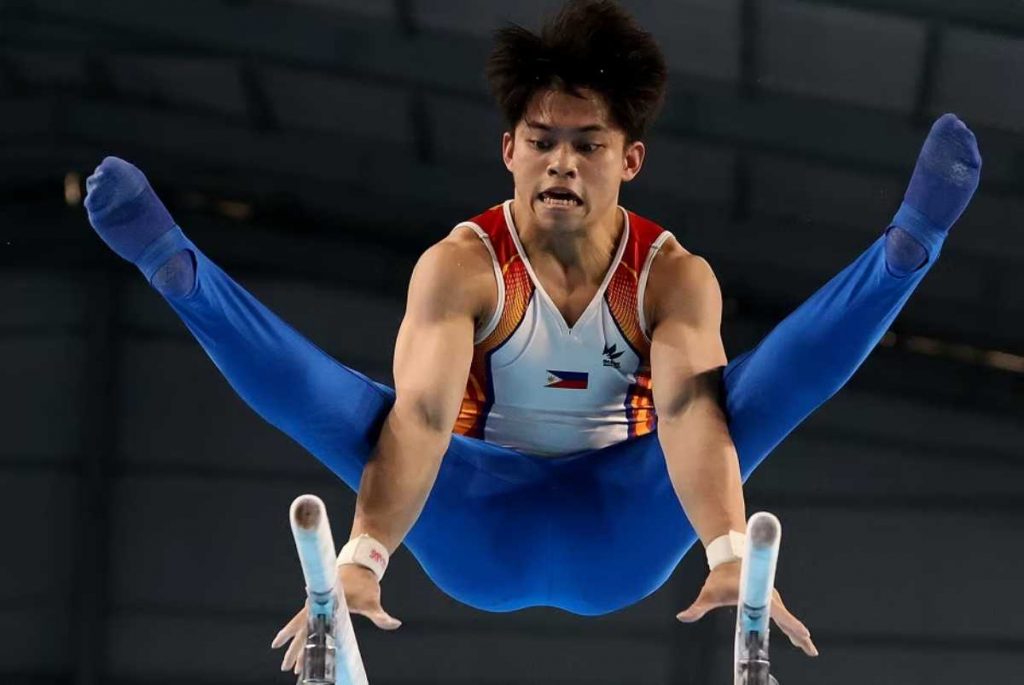 Carlos Yulo during the parallel bars event at the 32nd Southeast Asian Games in Cambodia on Tuesday, May 9, 2023. (POC/PSC Media handout)