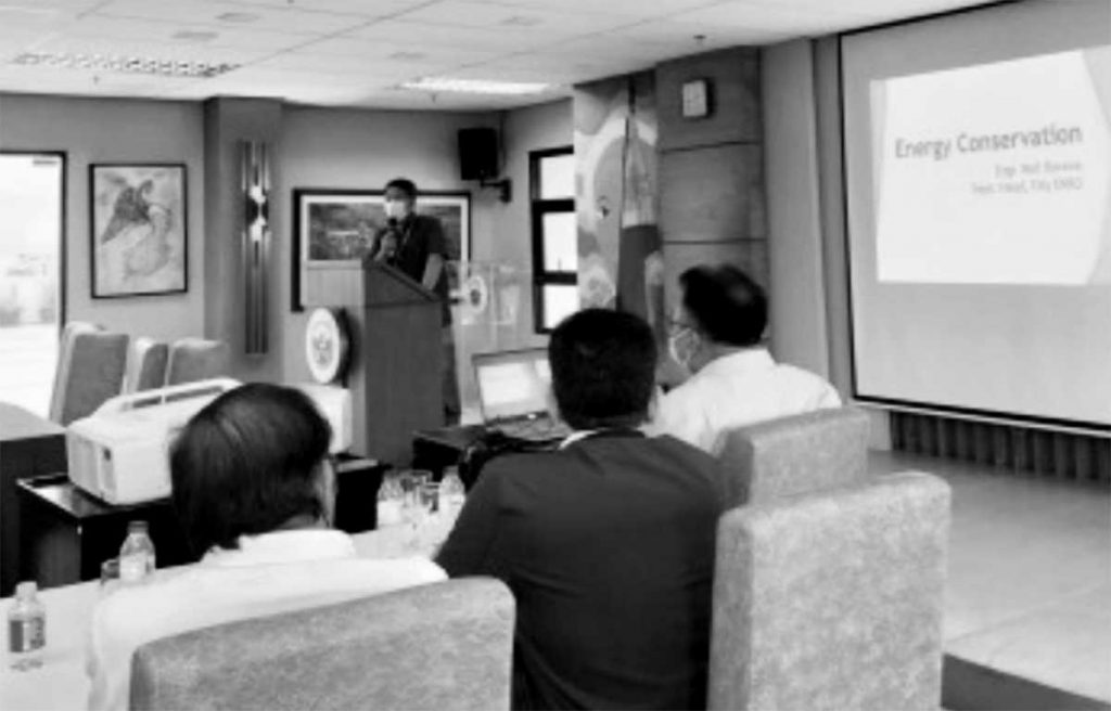 City Environment and Natural Resources Officer Neil Ravena (behind the podium) presents the energy-saving measures to be implemented in the city during their executive meeting at Iloilo City Hall on Tuesday, May 2, 2023. Iloilo City Mayor Jerry Treñas released Executive Order 49, containing the guidelines that will cover the offices of the city hall, villages, barangay facilities, schools, and local police offices and stations. (PNA photo)