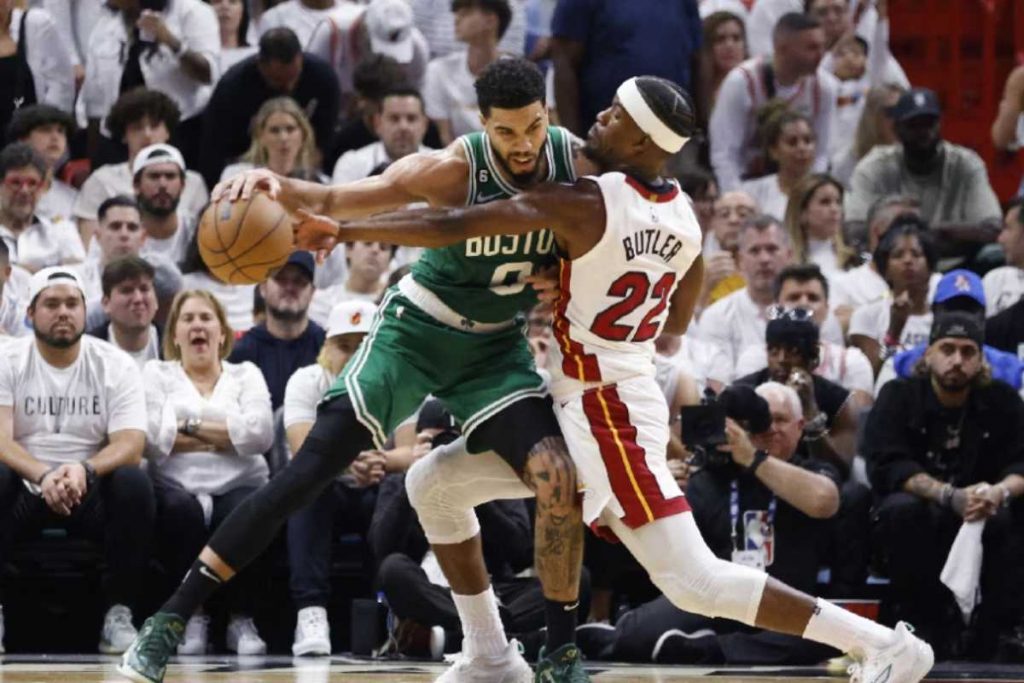 Miami Heat forward Jimmy Butler (right) defends Boston Celtics forward Jayson Tatum during the second half of the NBA basketball Eastern Conference Finals playoff Game 4 at the Kaseya Center in Miami, Florida on May 23, 2023. (Rhona Wise / EPA-EFE photo)