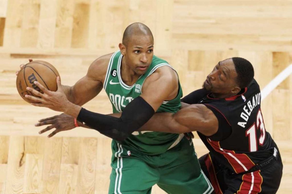 Boston Celtics center Al Horford (left) keeps the ball away from Miami Heat center Bam Adebayo during Game 5 of the Eastern Conference Finals at TD Garden in Boston, Massachusetts. (CJ Gunther / EPA-EFE photo)