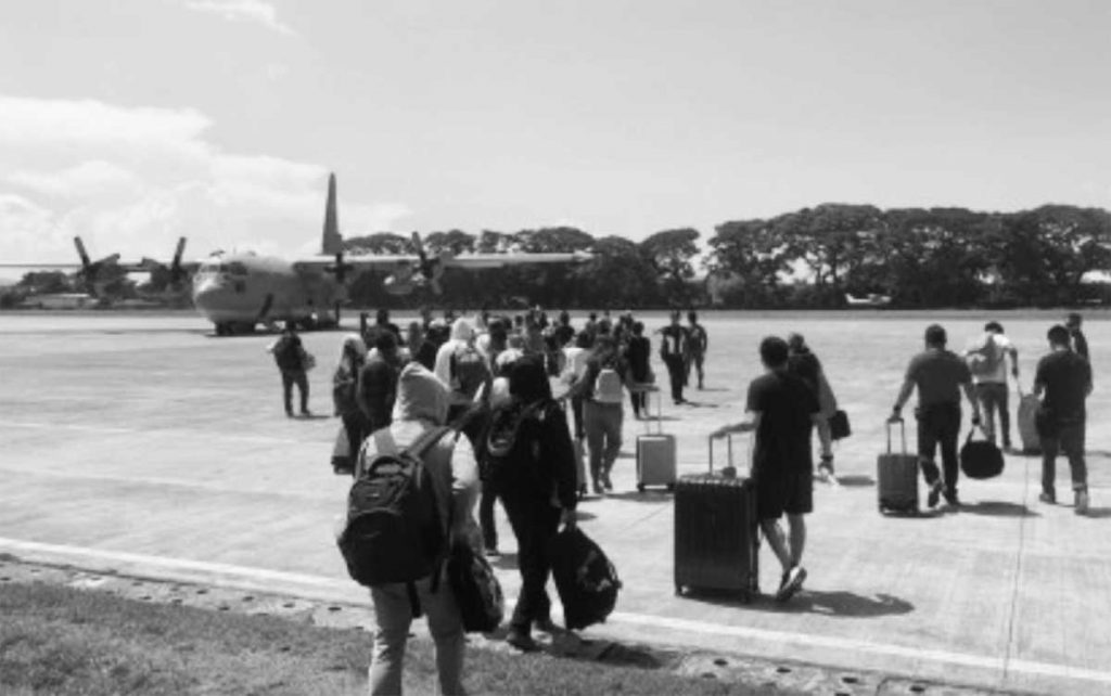 New witnesses to the killings in Negros Oriental board a C-130 Air Force aircraft at the Dumaguete-Sibulan airport yesterday, May 9, 2023. They will be attending the resumption of the Senate inquiry into the murder of Governor Roel Degamo, as well as many other killings in the province. (Contributed photo)