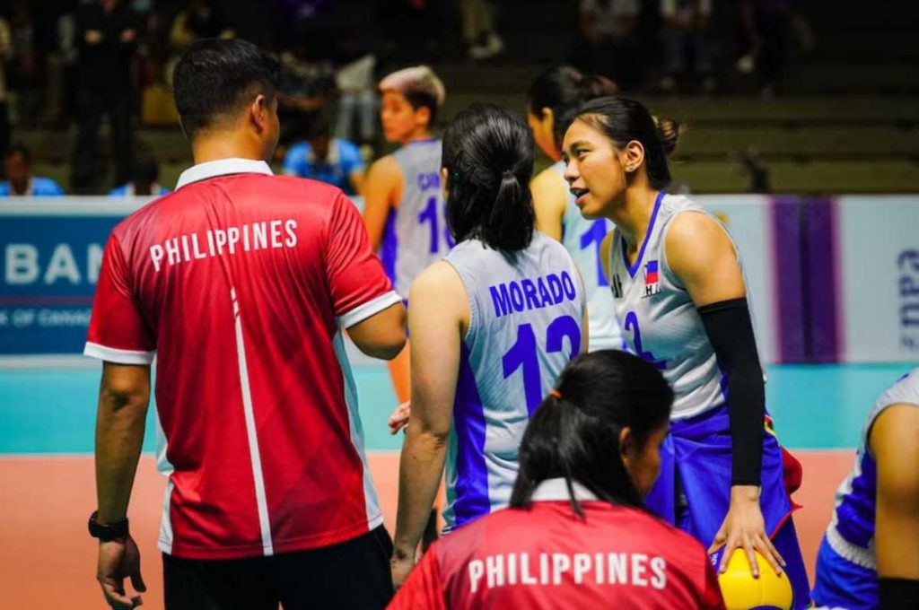 Alyssa Valdez and Jia Morado-de Guzman huddle with assistant coach Sherwin Meneses during their match against Vietnam at the 32nd Southeast Asian Games in Phnom Penh, Cambodia on May 10, 2023. Vietnam won, 25-20, 25-17, 25-19. (Photo courtesy Antonio Miguel de Guzman)