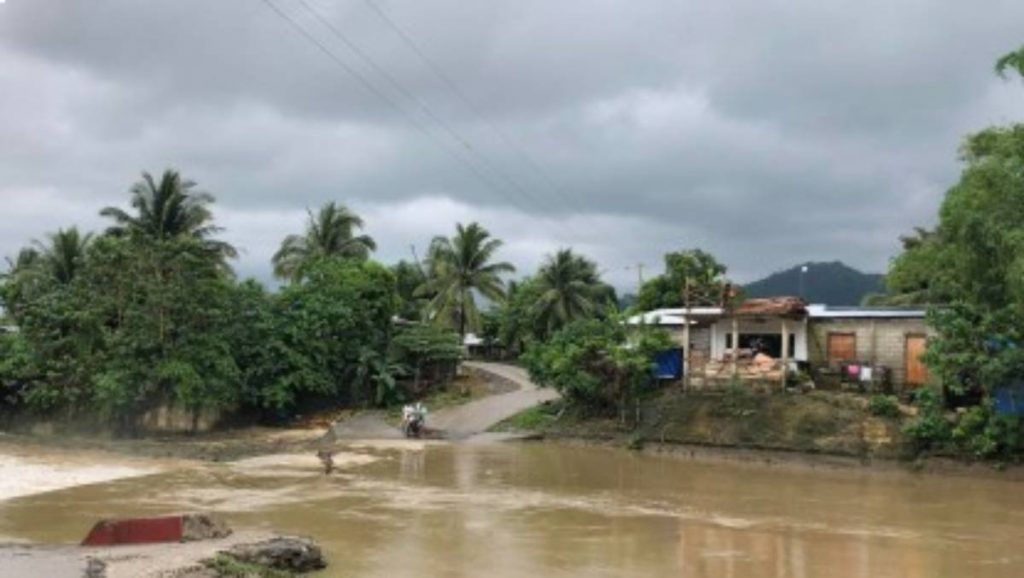 A spillway at Barangay Luyang in Negros Oriental’s Mabinay town overflowed yesterday afternoon, May 30, 2023, after river waters swelled. At least five spillways in Negros Oriental were rendered impassable due to heavy rains associated with Typhoon “Betty” and the southwest monsoon. (Photo courtesy of the Mabinay MDRRMO)