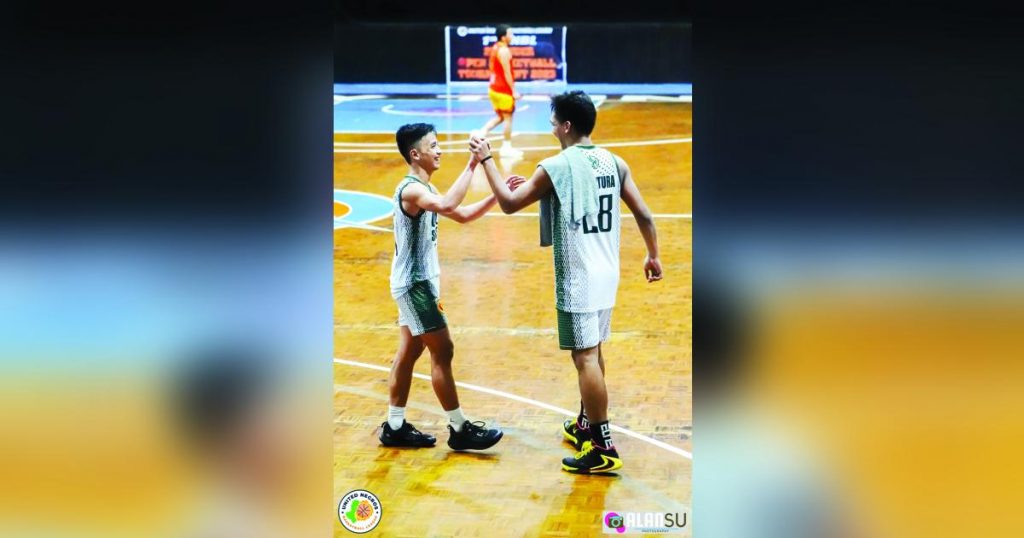 University of St. La Salle-Fyr Fyter’s Mark June de La Cruz (left) celebrates with teammate John Edmund Escultura for their successful play that forced overtime. (Alan Su photo) 