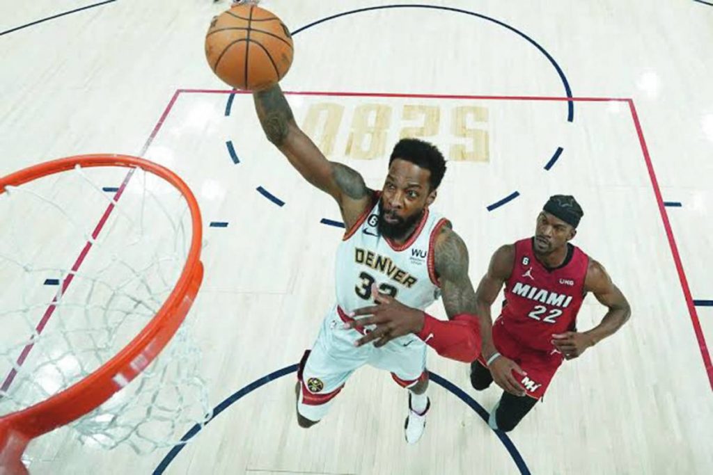 Denver Nuggets forward Jeff Green (32) dunks next to Miami Heat forward Jimmy Butler during the second half of Game 2 of the NBA finals yesterday, June 13, 2023 (Philippine time). (Jack Dempsey / AP photo)Denver Nuggets forward Jeff Green (32) dunks next to Miami Heat forward Jimmy Butler during the second half of Game 2 of the NBA finals yesterday, June 13, 2023 (Philippine time). (Jack Dempsey / AP photo)