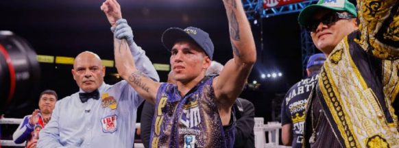 BOXING: Unbeaten Martinez stops Bornea to keep junior bantamweight title