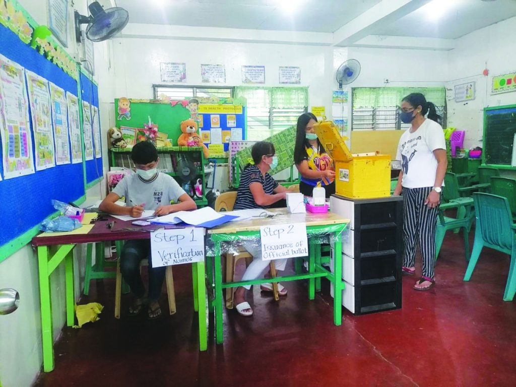 Committee members administer the plebiscite for the ratification of the joint venture agreement entered between Primelectric Holdings, Inc./Negros Electric Power Corporation and Central Negros Electric Cooperative (Ceneco) on June 24, 2023. Ceneco and Primelectric will submit the evidence for information dissemination of the agreement within 72 hours upon receipt of the temporary restraining order. (Contributed photo)