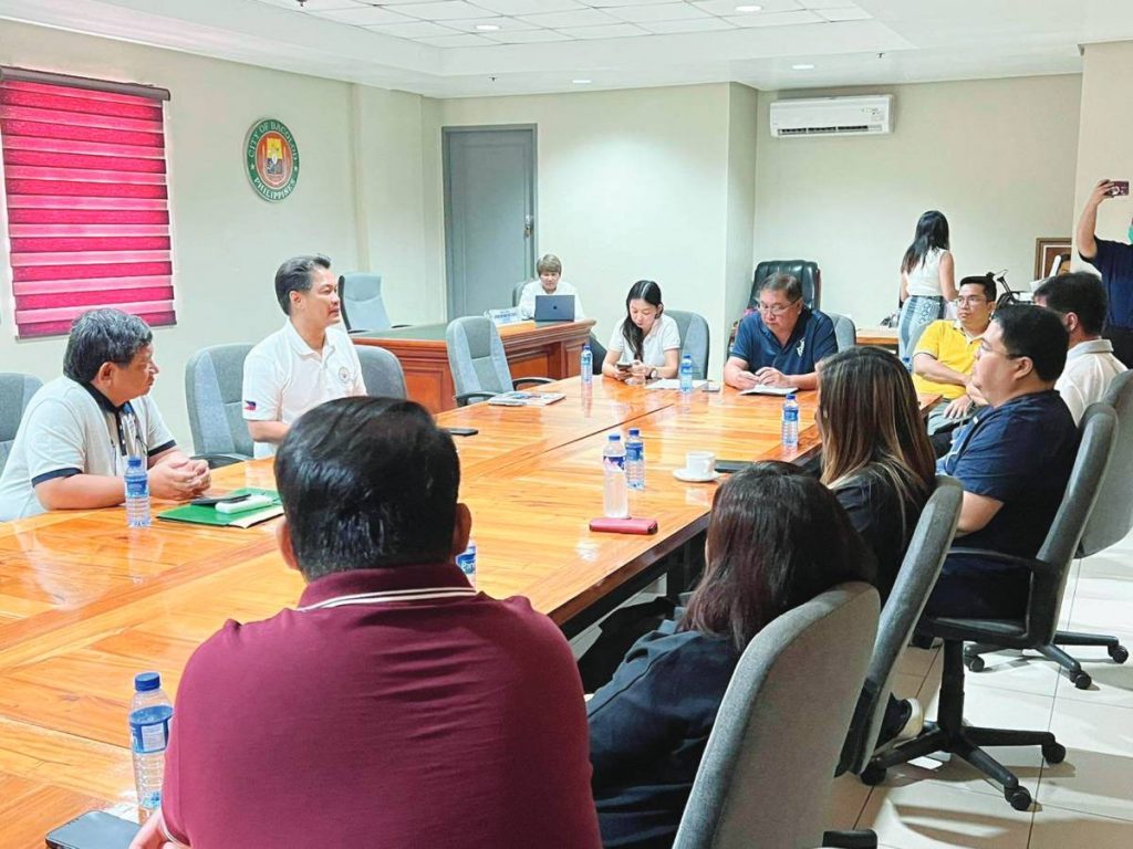 Bacolod City Mayor Alfredo Abelardo Benitez (second from left) and the city council met with MORE Electric and Power Corporation president and chief executive officer Roel Castro for a presentation on the proposed joint venture agreement with Central Negros Electric Cooperative on June 16, 2023, which Benitez called it satisfying because the agreement fits his “three conditions” for lowering the cooperative’s electricity rates.