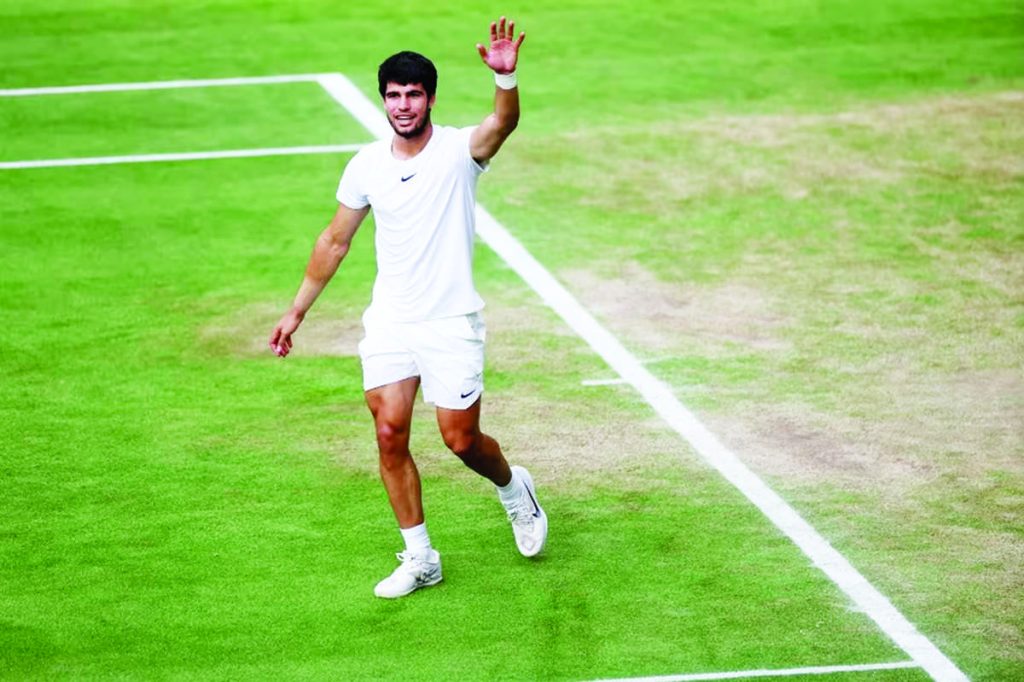 Carlos Alcaraz of Spain celebrates after winning his men's singles final match against Novak Djokovic of Serbia at the Wimbledon Championships, Wimbledon, Britain on Sunday, July 16, 2023. (Isabel Infantes / EPA-EFE photo)