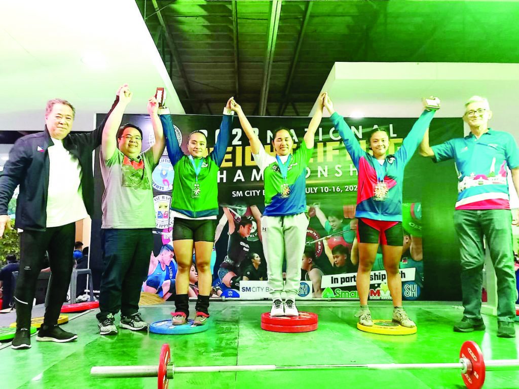 Hidilyn Diaz-Naranjo (center) captured the gold medal in the women's 59-kilogram division of the Samahang Weightlifting ng Pilipinas’ National Weightlifting Championships held recently at a mall in Bacolod City. (Photo courtesy of Andrew Altarejos)