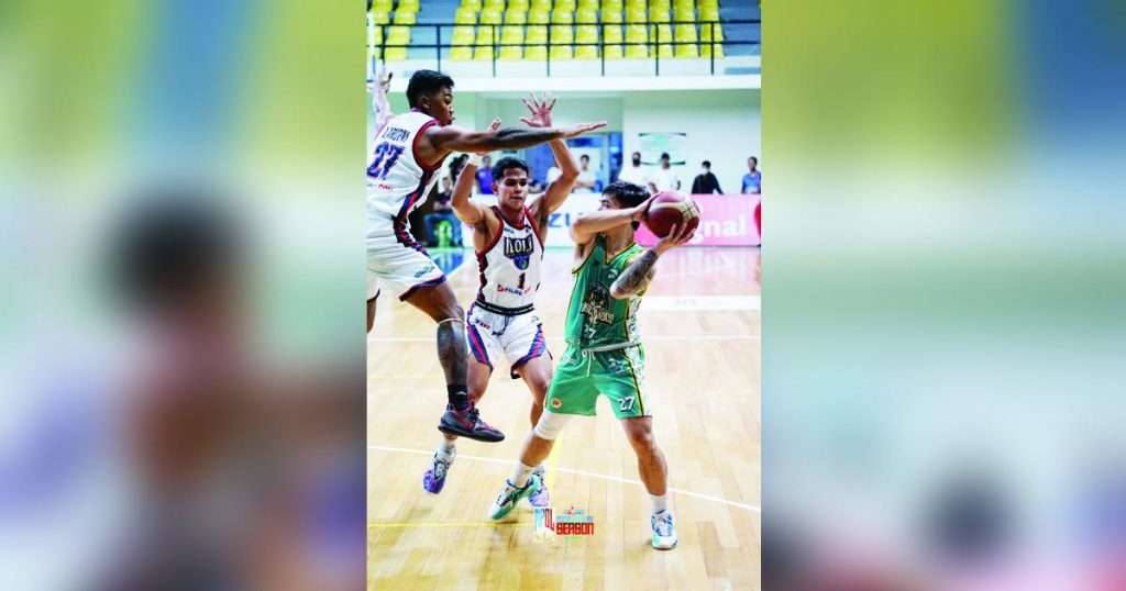 Negros Pau Muscovados’ Camillus Altamirano looks to pass the ball after being bothered by Iloilo United Royals' Tony Ynot and Omar Larupay. (MPBL photo)