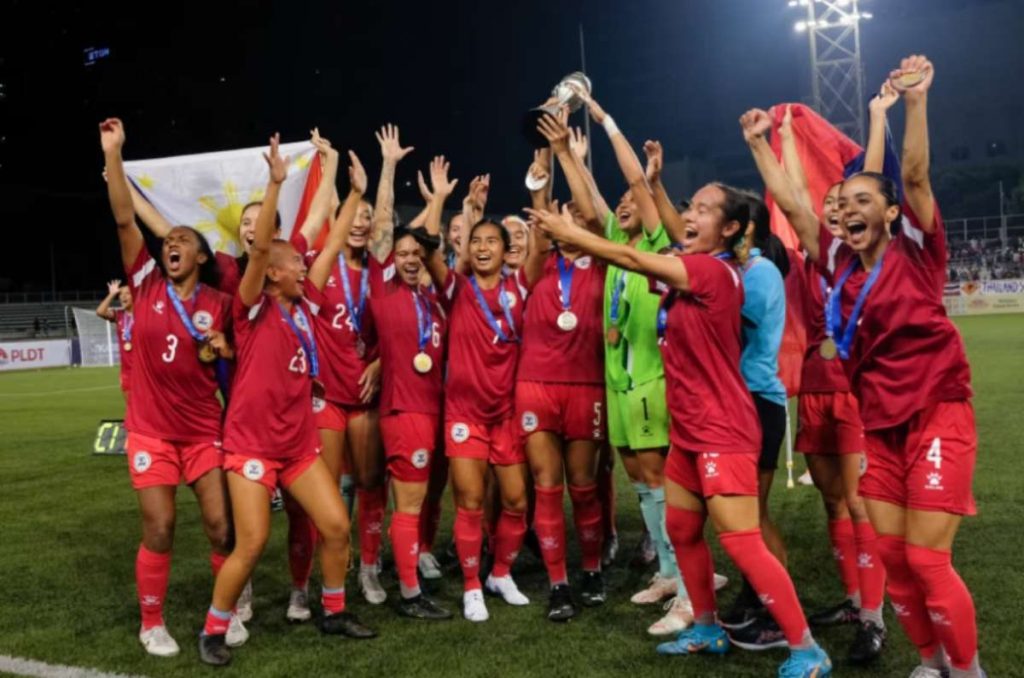 Members of the Philippine Women's National Football Team celebrate after winning the ASEAN Football Federation Women's championship title at the Rizal Memorial Stadium in 2022. (George Calvelo / ABS-CBN News / File photo)