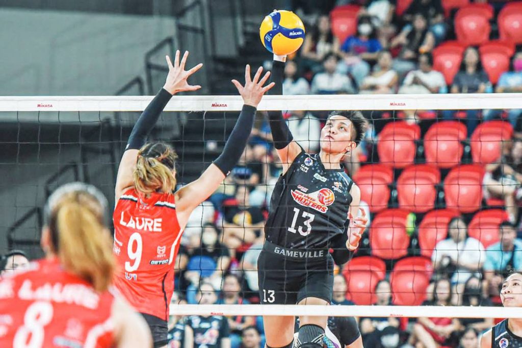 Aklanon Dell Palomata of PLDT High Speed Hitters goes for a drop shot against Chery Tiggo Crossovers’ Ennajie Laure. (PVL photo)