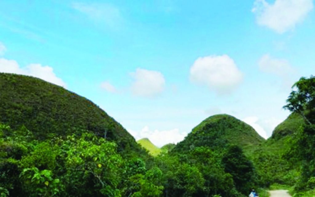 The "chocolate hills" version of Negros Oriental, found in Guihulngan City’s Hinakpan town, is a potential tourist destination. The Negros Oriental Provincial Tourism Board is embarking on a program that will identify and develop potential tourist destinations. (Judy Flores Partlow photo)