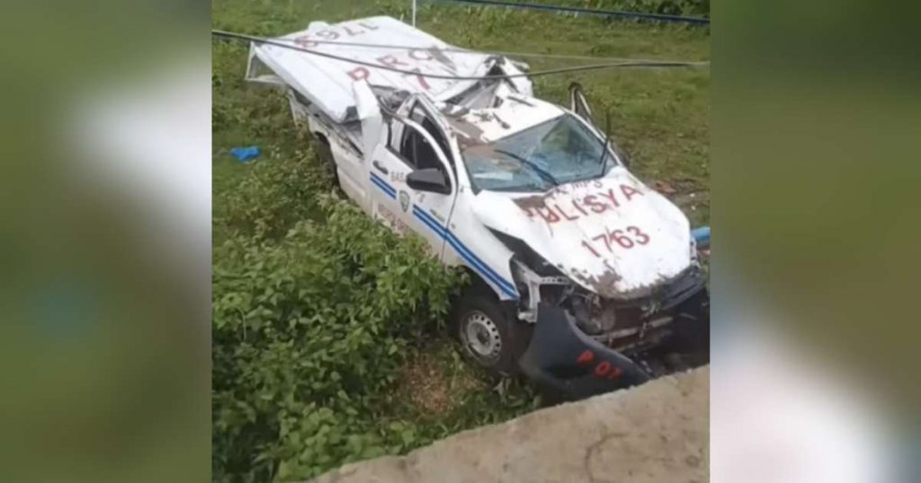 The patrol car driver lost control due to a slippery road as he overtook a tricycle. (Contributed photo)