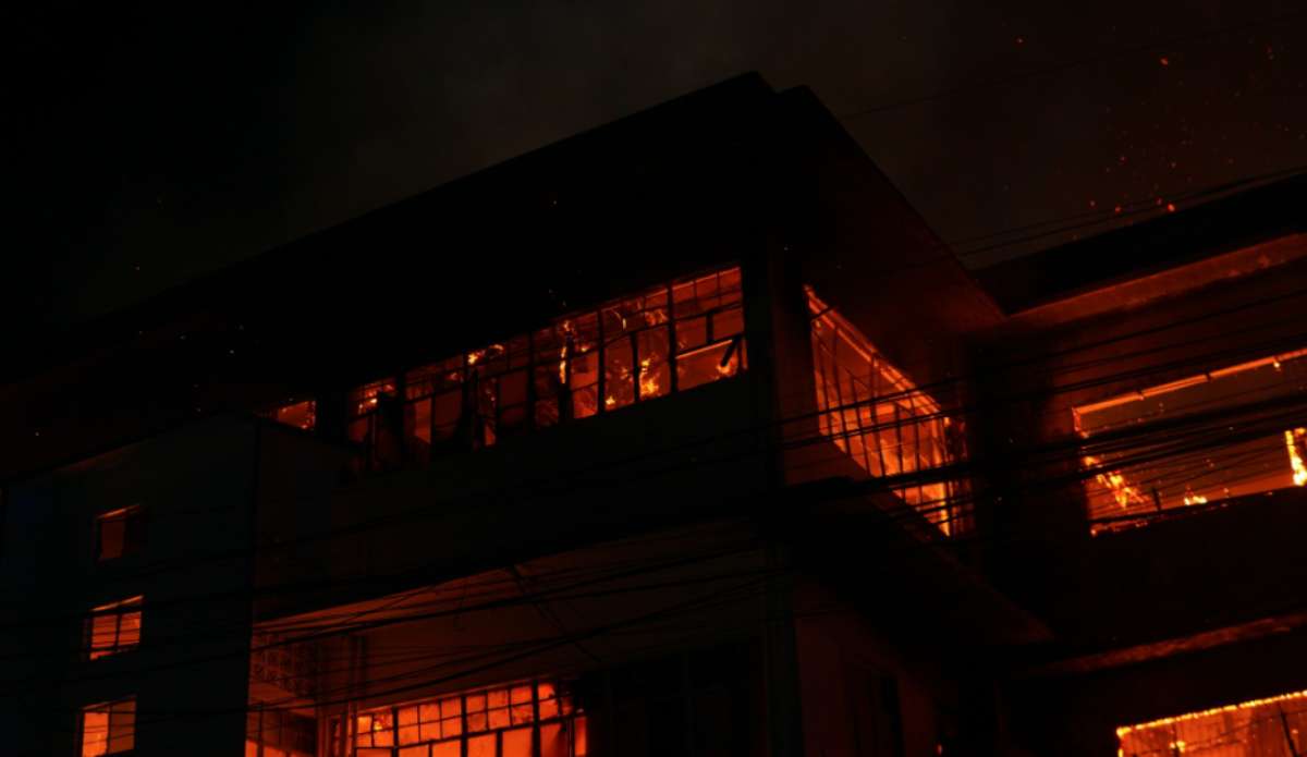 The fire, which gutted the main building of the Colegio De Sta. Rita, was likely caused by faulty electrical wiring, the Bureau of Fire Protection in San Carlos City says. (Mayor Rene Gustilo / Facebook photo)