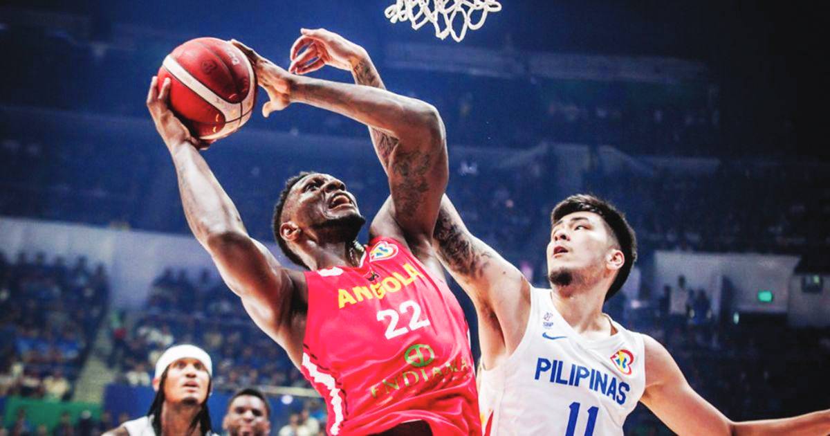 Kai Sotto (11) against Silvio de Sousa of Angola (FIBA photo)