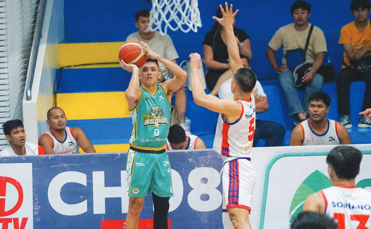 Negros Pau Muscovados’ Jonathan Gantalao, Jr. attempts a three-point shot.