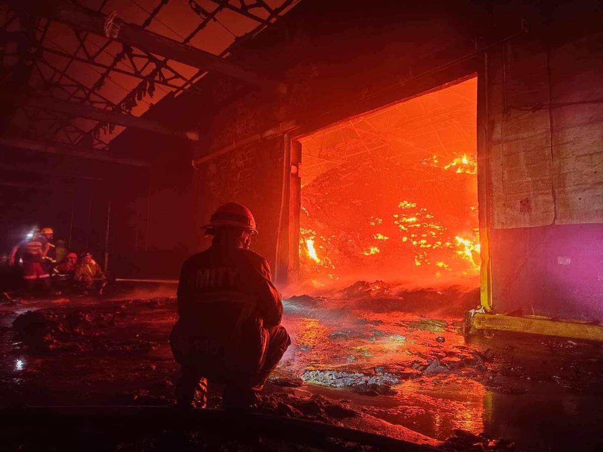 Authorities have yet to determine the cause of the blaze that hit a raw sugar warehouse and clinic inside the Victorias Milling Company in Negros Occidental’s Victorias City on Sunday, August 27, 2023. (Amity Volunteer Fire Brigade photo)
