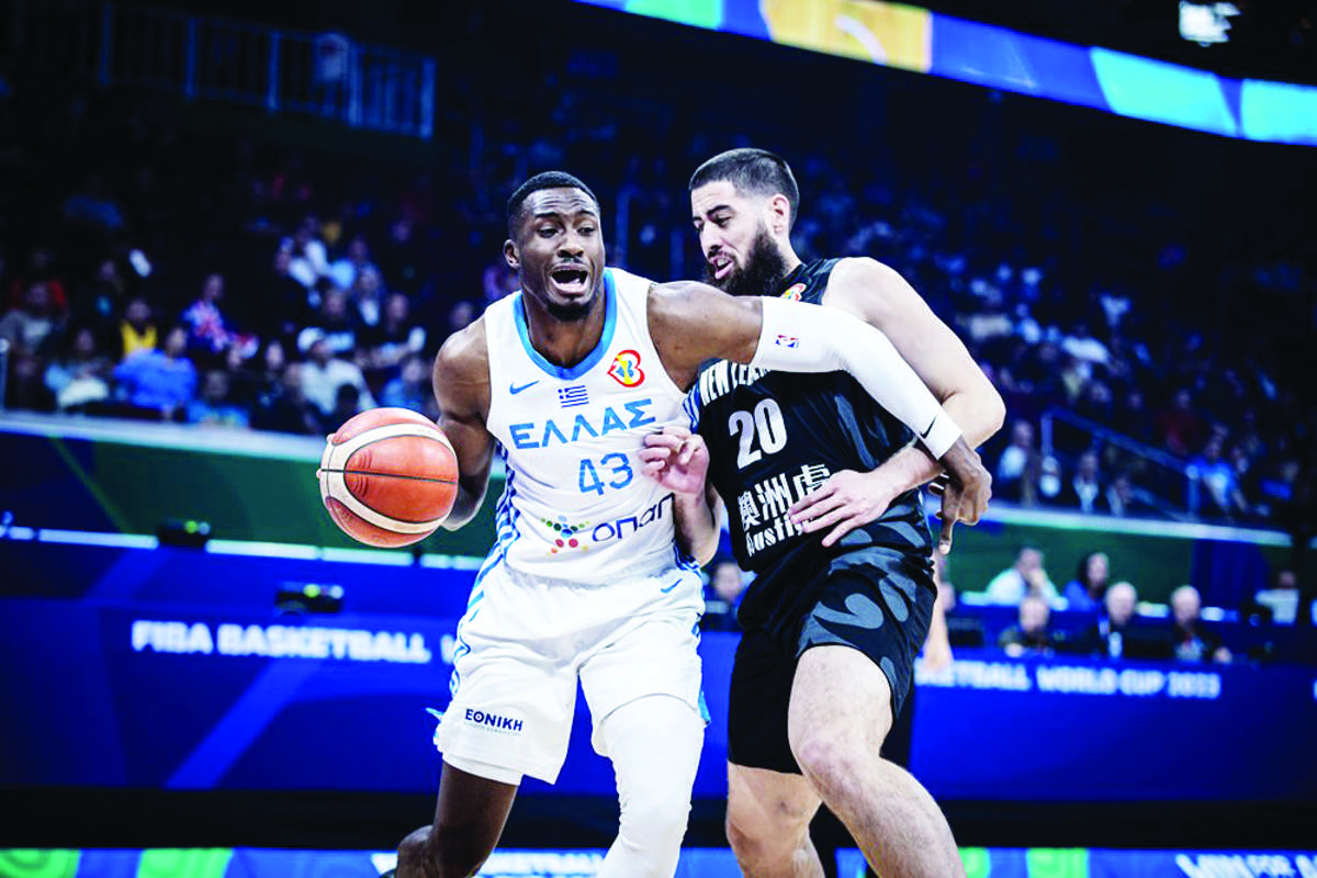 Greece’s Thanasis Antetokounmpo wards off the defense of New Zealand’s Jordan Ngatai during their 2023 FIBA Basketball World Cup game on Wednesday night, August 30, 2023. (FIBA photo)