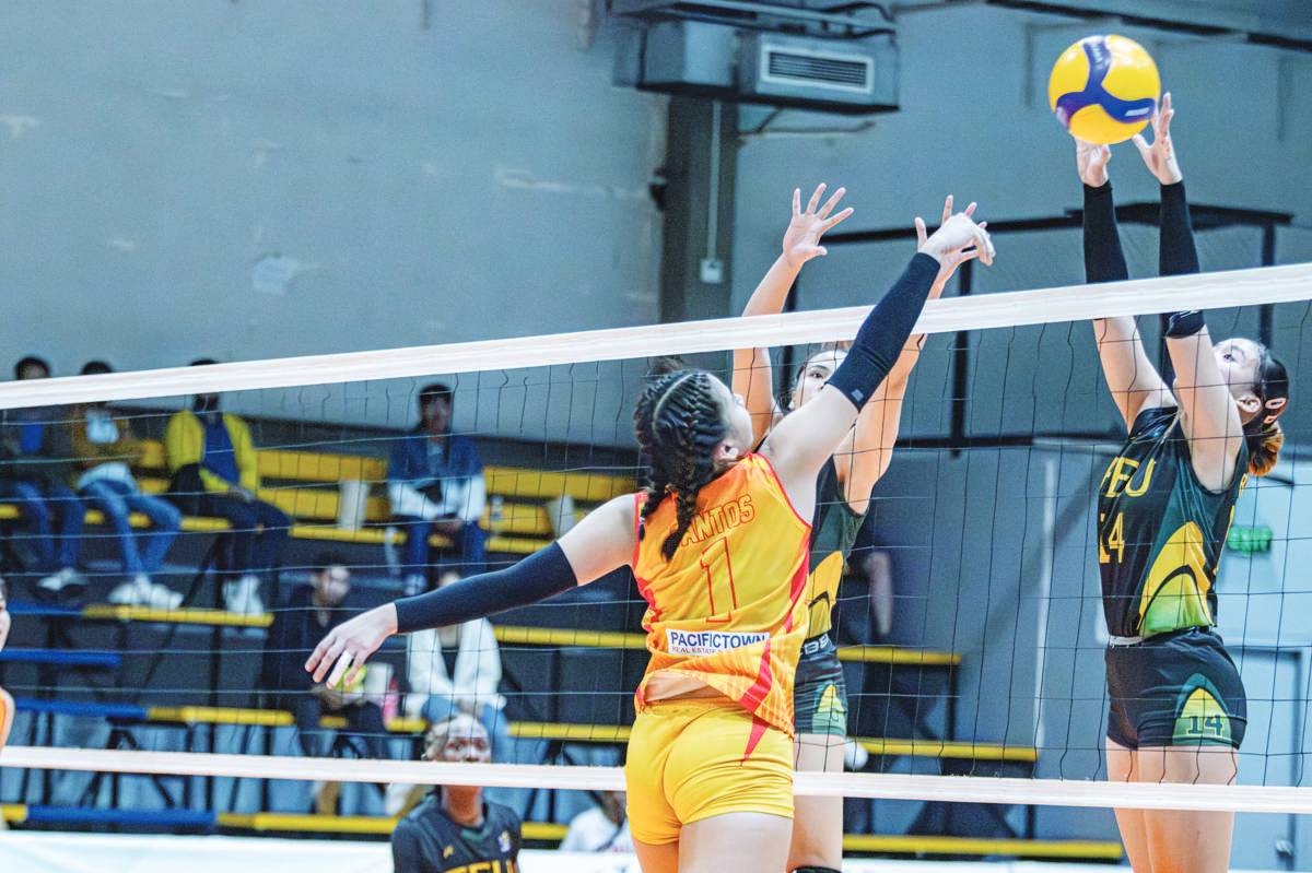 Negrense Kiesha Bedonia of the Far Eastern University Lady Tamaraws blocks the shot of San Sebastian College Lady Stags' Katherine Santos. (V-League photo)