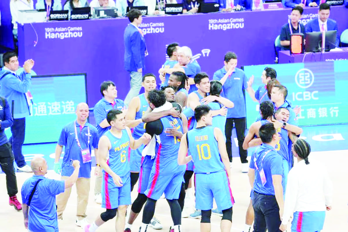 Gilas Pilipinas celebrates after defeating Jordan, 70-60, in the men’s basketball gold medal match of the Asian Games in Hangzhou, China on October 6, 2023. The Philippine Olympic Committee says Gilas Pilipinas will not be stripped away of its historic gold medal in the men’s basketball event despite Justin Browlee failing the doping test. (PSC-POC Media Pool / Handout)