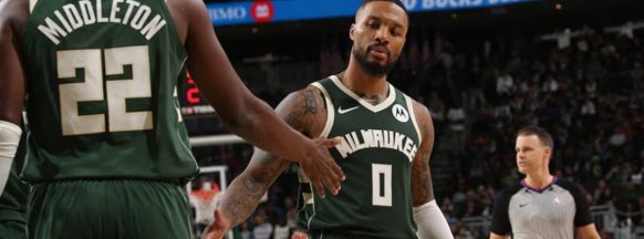 Lillard scores 39 in Bucks debut to edge 76ers in NBA opener