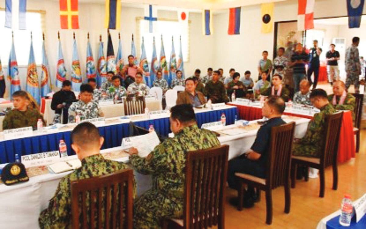 Officials from the Philippine National Police, Armed Forces of the Philippines, Philippine Coast Guard (PCG), and Bureau of Fire Protection discuss security measures during the third quarter Visayas Joint Peace and Security Coordinating Center at PCG-Central Visayas headquarters in Cebu City on Tuesday, October 24, 2023. Visayas Command chief, Lt. General Benedict Arevalo, said 17,463 soldiers will secure polling places in the three regions of the Visayas. (Viscom PIO photo)