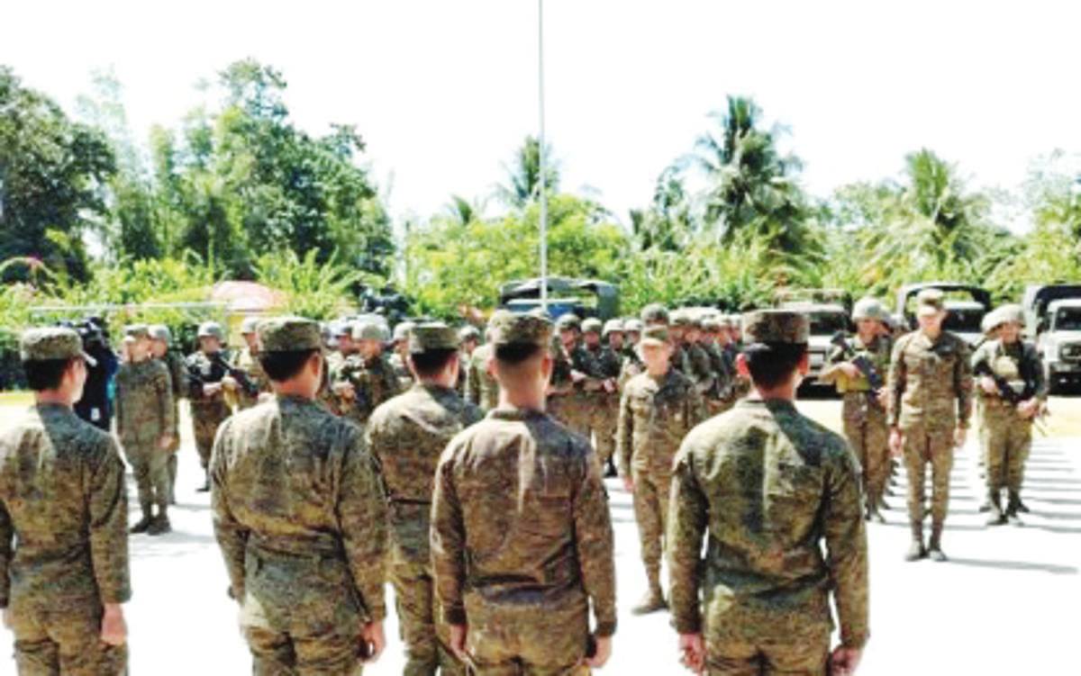 Four platoons of Army soldiers stand in formation in preparation for their travel to Negros Oriental on Monday, October 17, 2023, to augment the existing force for the barangay and Sangguniang Kabataan elections on October 30. Visayas Command chief, Lt. General Benedict Arevalo says the additional troops will ensure the safety and security of the people in Negros Oriental during the elections. (Viscom PIO photo)