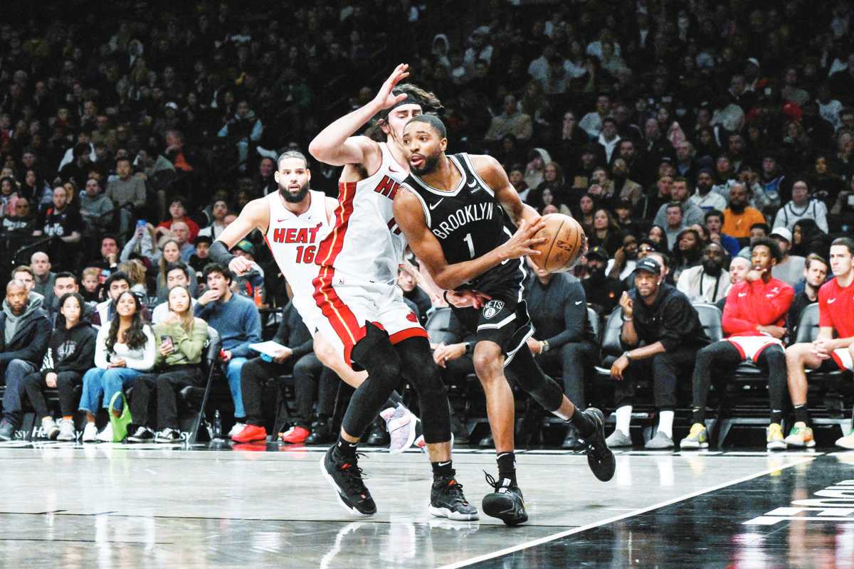 Brooklyn Nets forward Mikal Bridges (1) drives past Miami Heat guard Jaime Jaquez, Jr. (11) during an NBA game at the Barclays Center. (John Jones / Reuters photo)