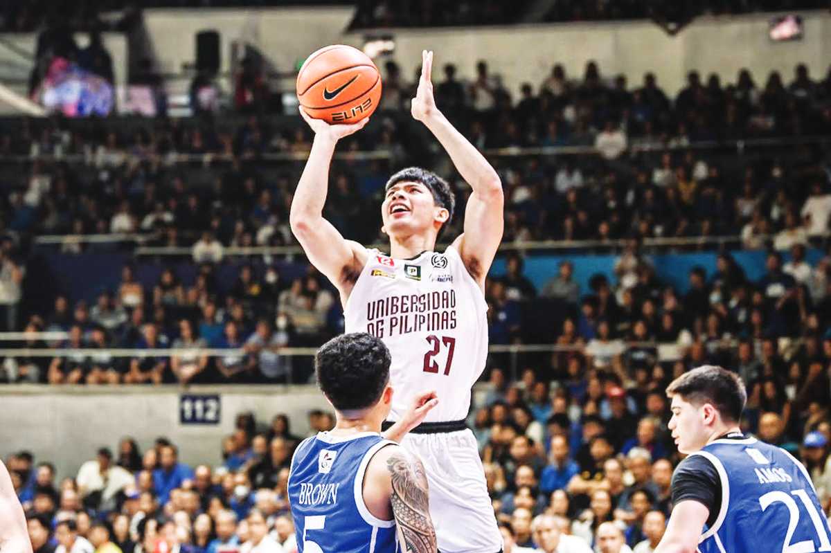 University of the Philippines Fighting Maroons’ CJ Cansino pulls up for a basket. (UAAP photo)