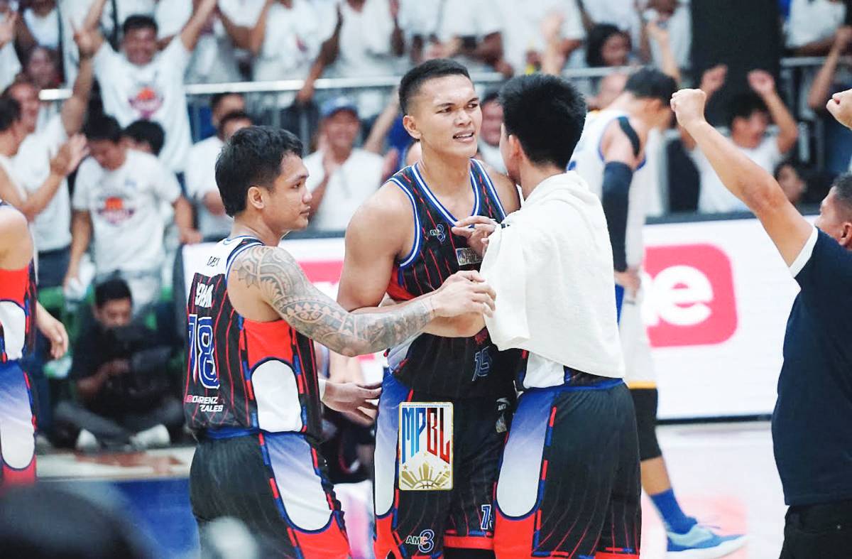 Encho Serrano and Justine Baltazar celebrate as the Pampanga Giant Lanterns captured the MPBL crown. (MPBL photo) 