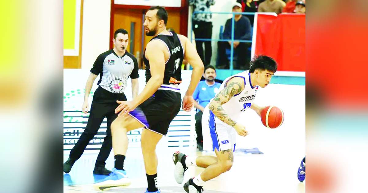 Strong Group-Philippines' Kevin Quiambao runs away with the ball after evading the defense of Beirut Club’s Mohamad Ali Haidar. (UAE Basketball Association photo) 