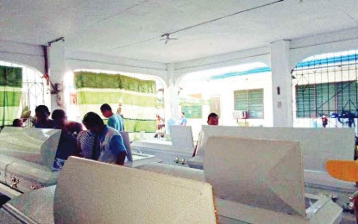 Relatives flocked to a funeral parlor in La Libertad, Negros Oriental yesterday, February 22, 2024, to view the remains of those who perished in the tragic road accident in Mabinay, Negros Oriental. Fifteen people died and two others were seriously hurt when their truck lost its brakes and fell off a cliff on Wednesday, February 21, 2024. (Negros Oriental Police Provincial Office photo)