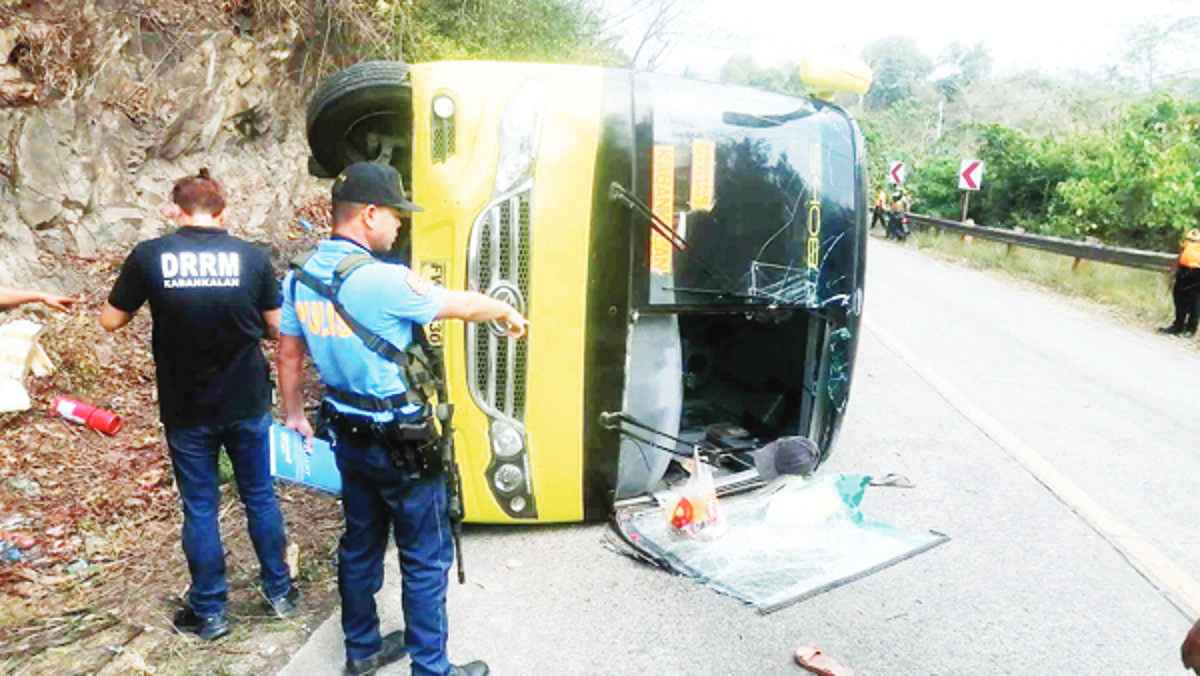 At least 35 passengers sustained minor injuries after a bus fell on its side at Barangay Salong in Negros Occidental’s Kabankalan City yesterday morning, February 9, 2024. (Kabankalan police photo)